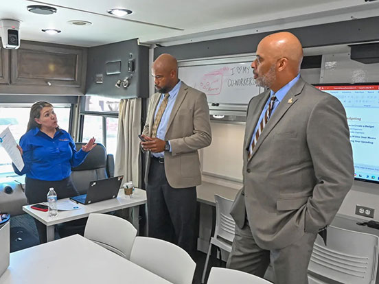  This is a photo of the superintendent touring a mobile express tech lab